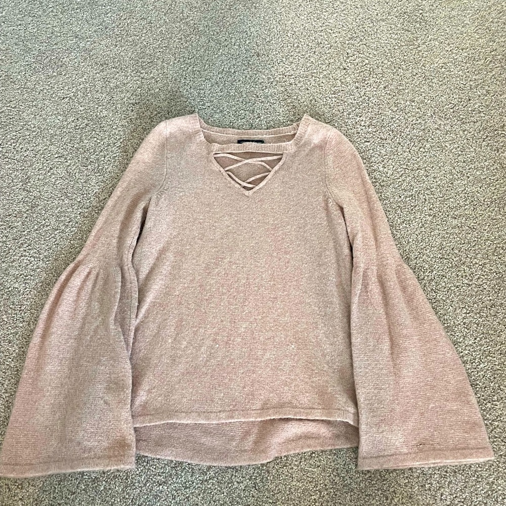 Kashmir pink arm-flare sweater with cross ties